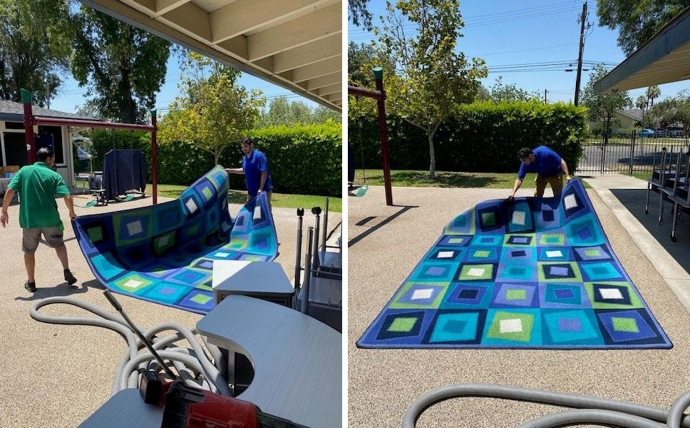 The Blue Sky team laying out and finishing a large area rug cleaning on site in Riverside